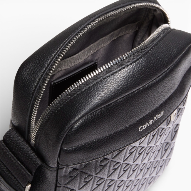 EMBLEM EMBOSS REPORTER